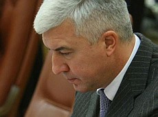 Саламатін та заступник Табачника показали свої годинники