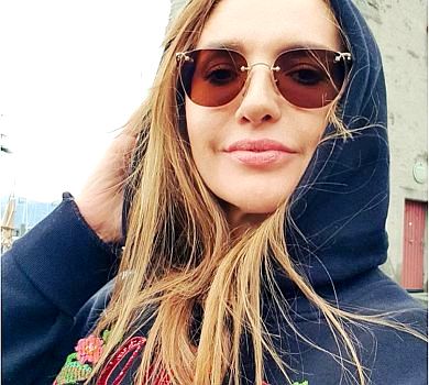 Марченко в топі та шортиках пробігла понад 10 кілометрів заради доньки. ВІДЕО