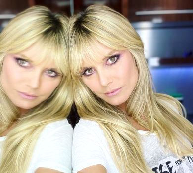 47-річна Клум із-за фіранки показала соски молодому чоловіку. ФОТО