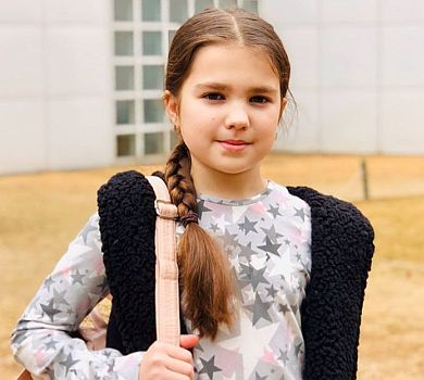 13-річна донька Подкопаєвої відрізала коси заради хворих дітей 