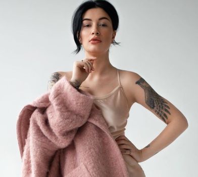 Сова, герб та символ любові: Приходько розповіла про свої тату