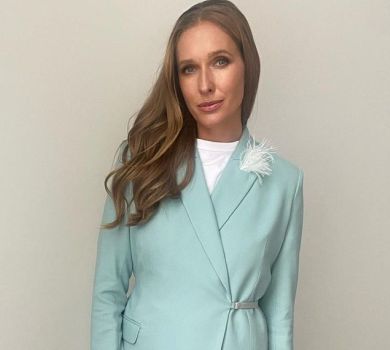 Збиралася навпомацки: Осадча у м'ятному костюмі підбадьорила українців