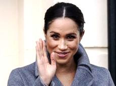 Маркл підкреслила чималий живіт світлим платтям у квітки. ФОТО 