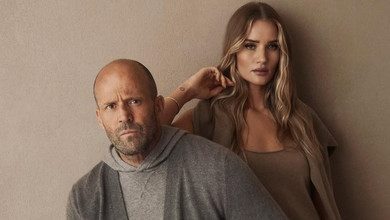 Стильна парочка: Стейтем з сивою бородою засвітився на Тижні моди з коханою в шкіряному тренчі. Фото