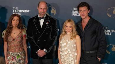 Кайлі Міноуг у кремовому міні з тюлю попозувала з принцом Вільямом на його премії в Ріо-де-Жанейро. Фото