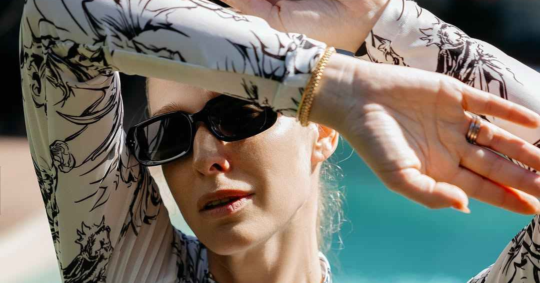 Катерина Осадча похизувалася фігурою в купальнику з SPF - фото