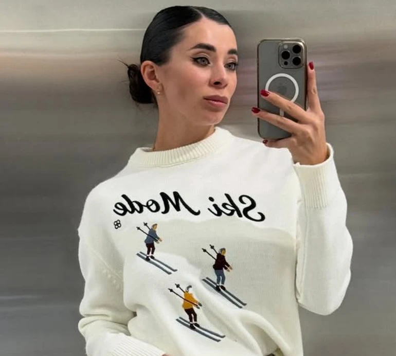 Коли в квартирі 9 градусів: Неплях із пуховою хусткою на попереку та в шапці показала свій домашній лук