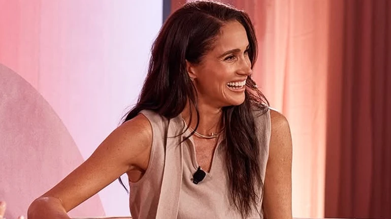 Репетиція повернення до королівських обов'язків? Принц Гаррі та Меган Маркл з ніг до голови у брендах провели тур Австралією