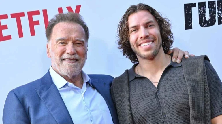 Позашлюбний син Шварценеггера після тренувань з батьком дебютував на чемпіонаті з бодібілдингу та забрав три золота. Фото