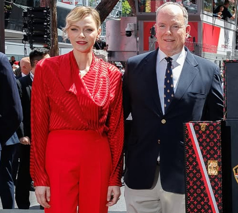 Ефектний червоний та розкішний білий: княгиня Монако продемонструвала два образи на Формулі-1. Фото