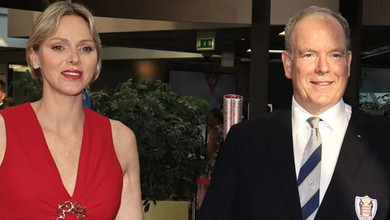 У сережках за $1600 та з оголеним плечем: княгиня Шарлін вигуляла два елегантні образи та попозувала з Усиком