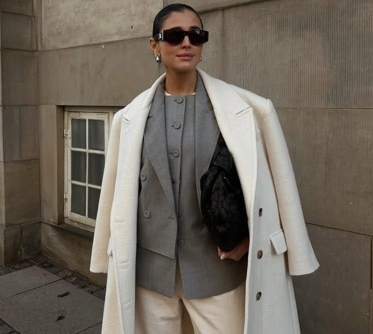 Светр замість шарфа і сукня-комбінація під все: як носити багато шарів і виглядати стильно. Фото