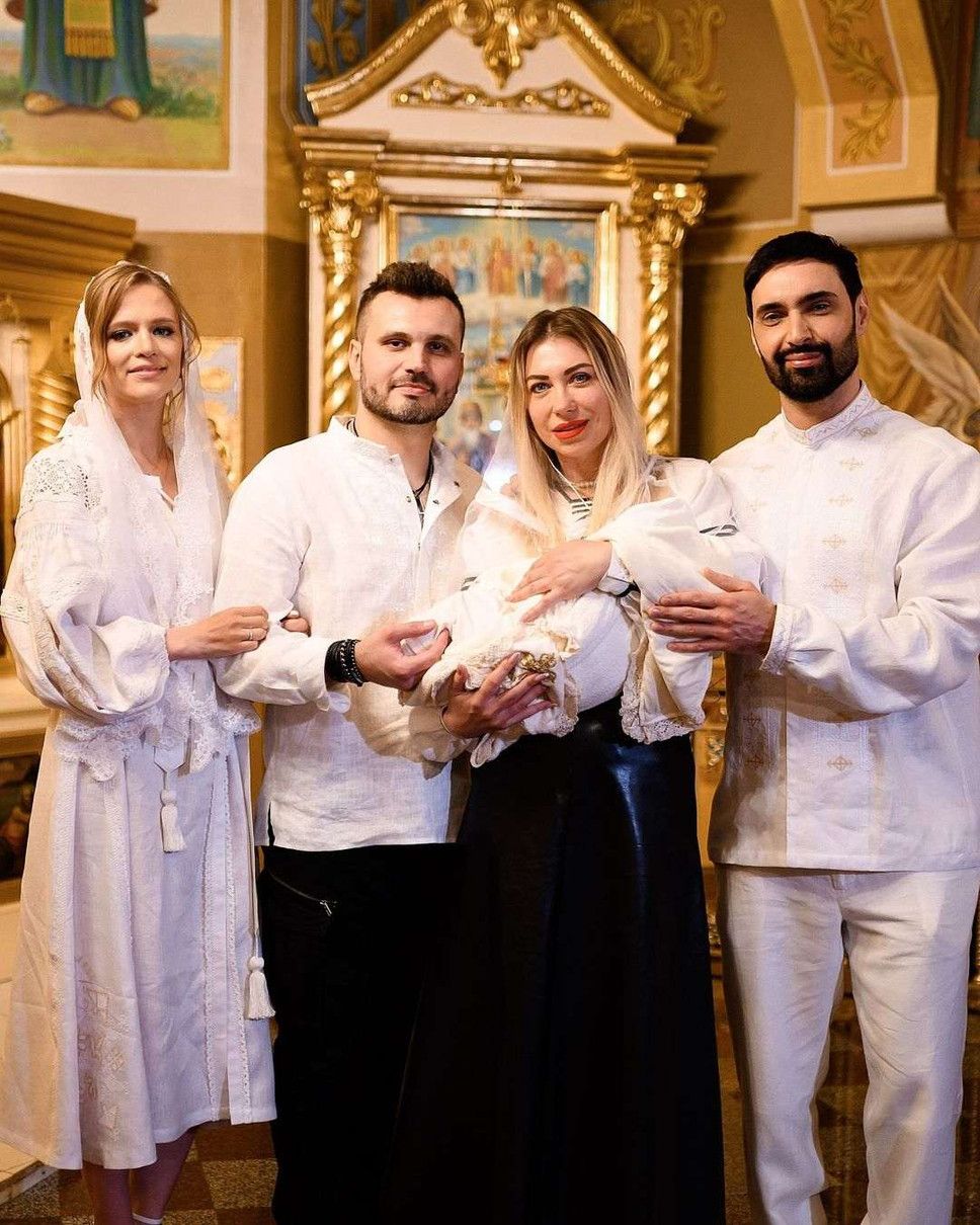 Козловський з дружиною на хрестинах їхнього сина