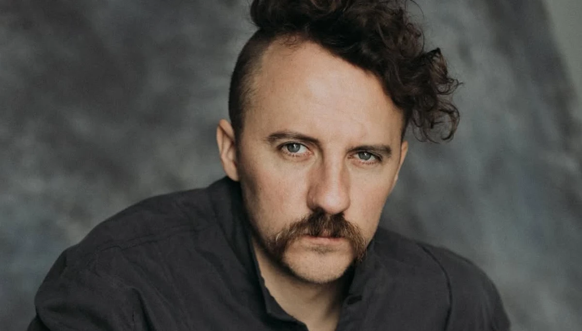 Євген Клопотенко позує для фото