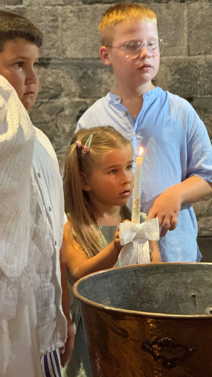 Руслан Маліновський замилував, як його дочка допомагала на хрещенні свого брата