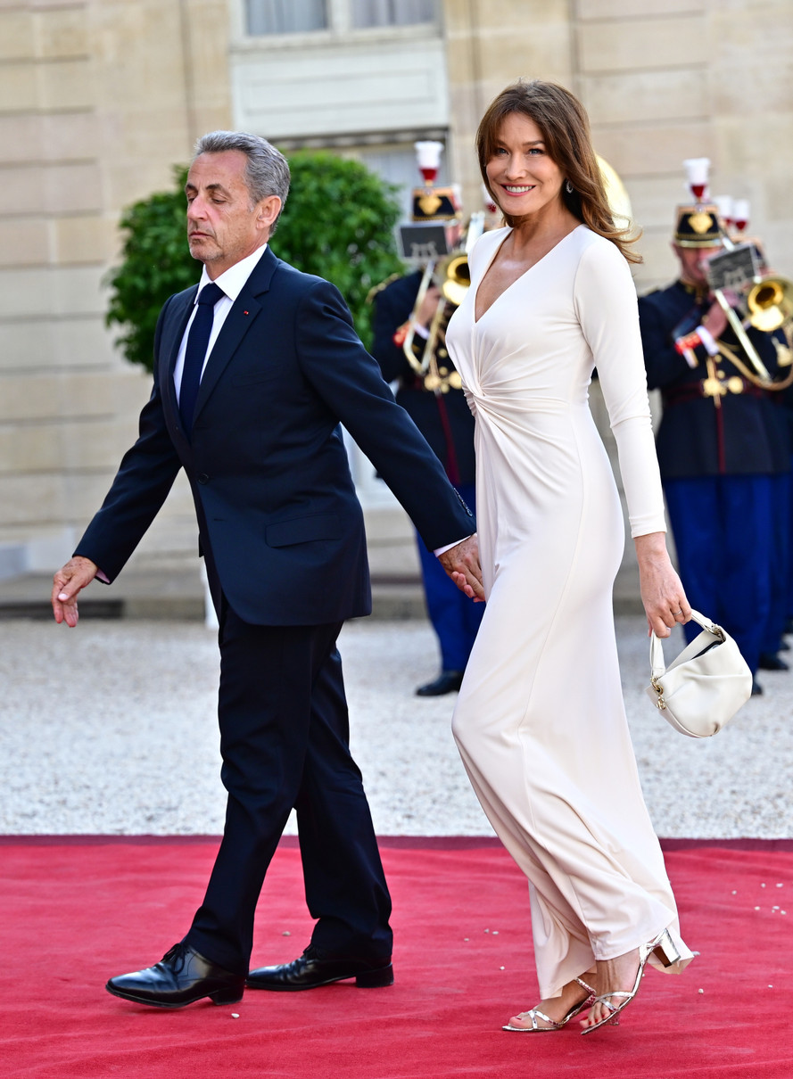 Ніколя Саркозі і Карла Бруні на прийомі