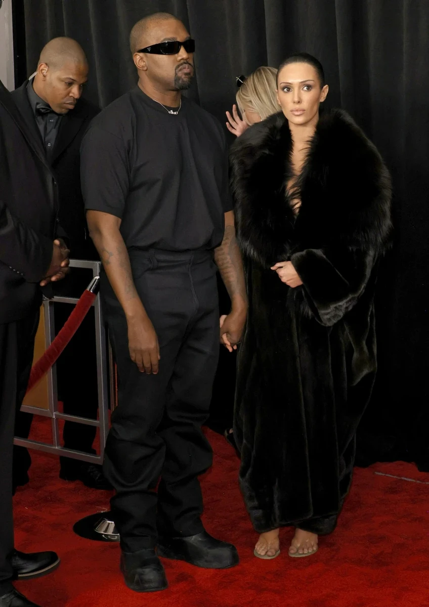 Каньє Вест з дружиною на фото