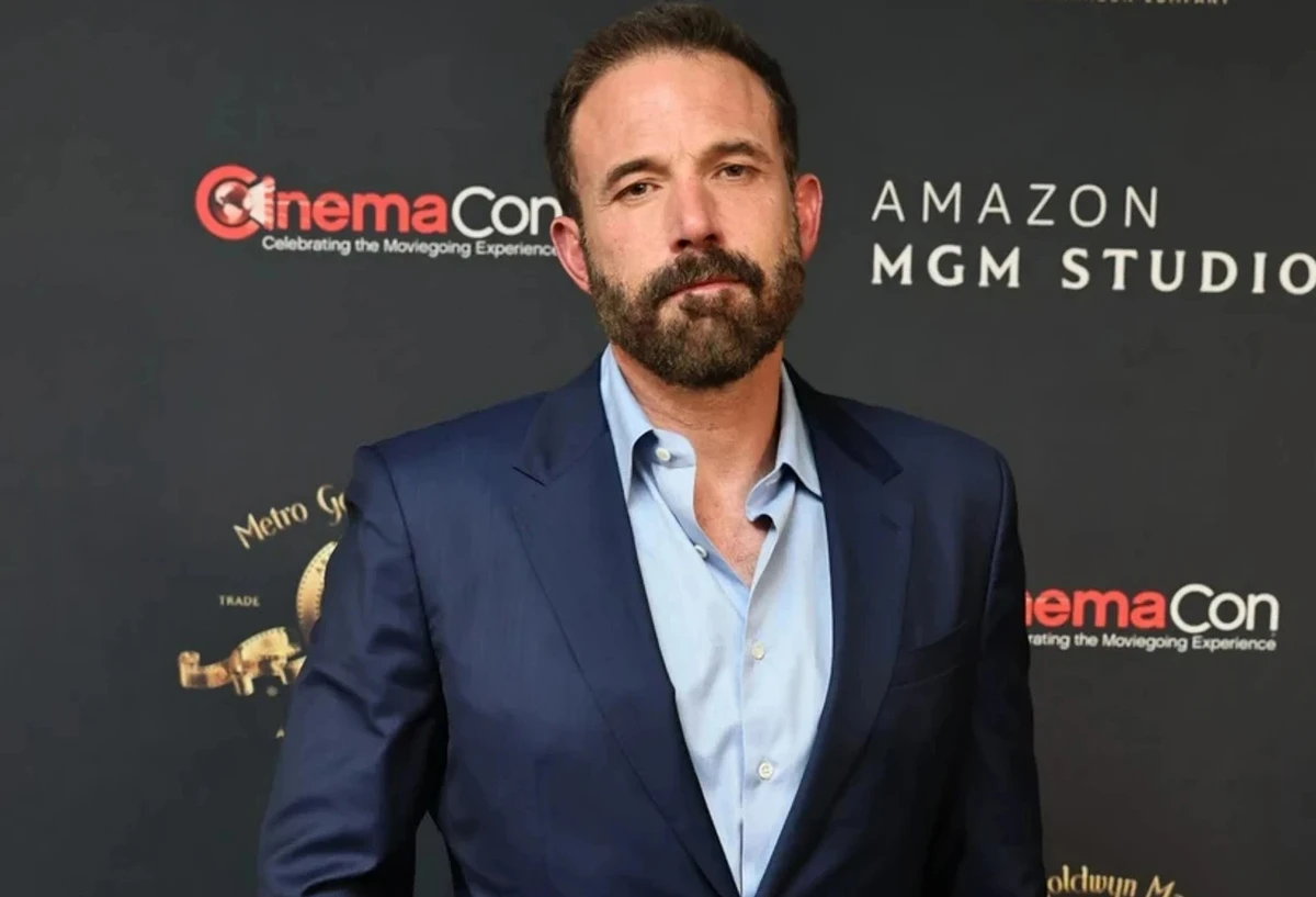 Бен Аффлек позує для фото