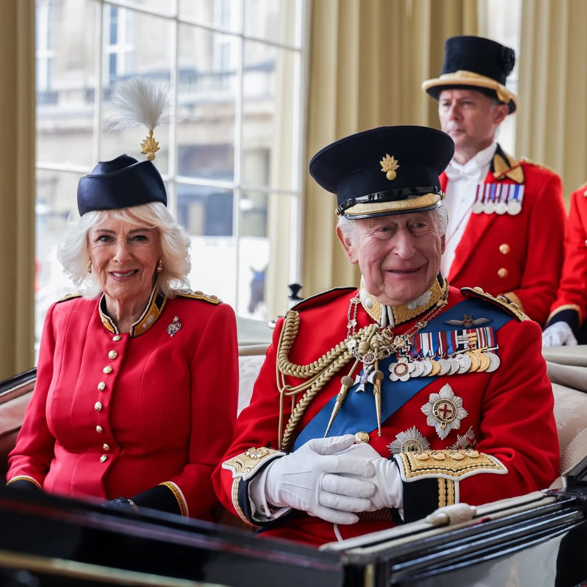 Queen Camilla with her husband at a parade in his honor