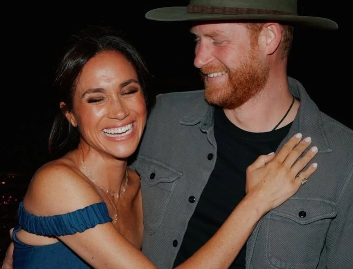 Меган Маркл та принц Гаррі на концерті