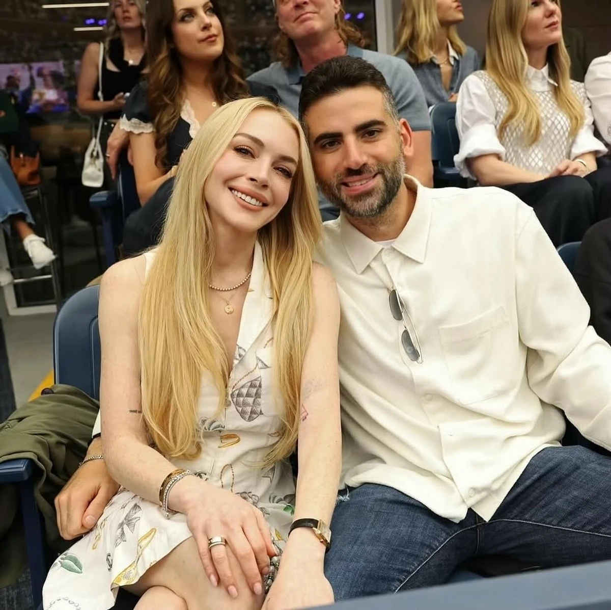 Ліндсей Лохан з чоловіком на матчі