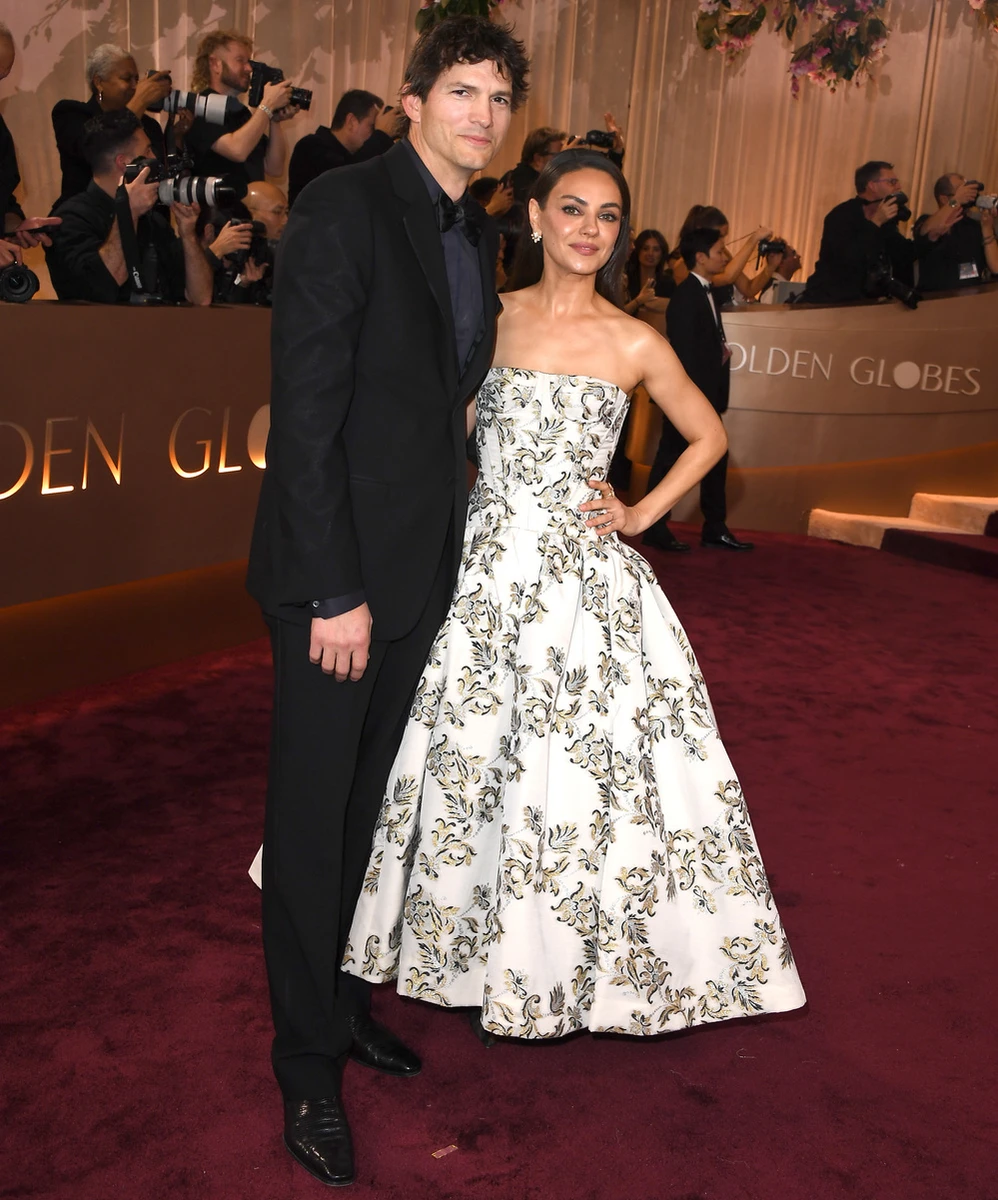 Міла Куніс та Ештон Кутчер у стильних луках на Золотому глобусі 2026