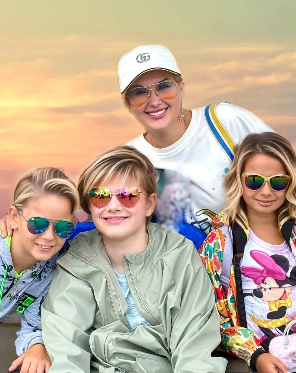 Катерина Бужинська і її троє дітей