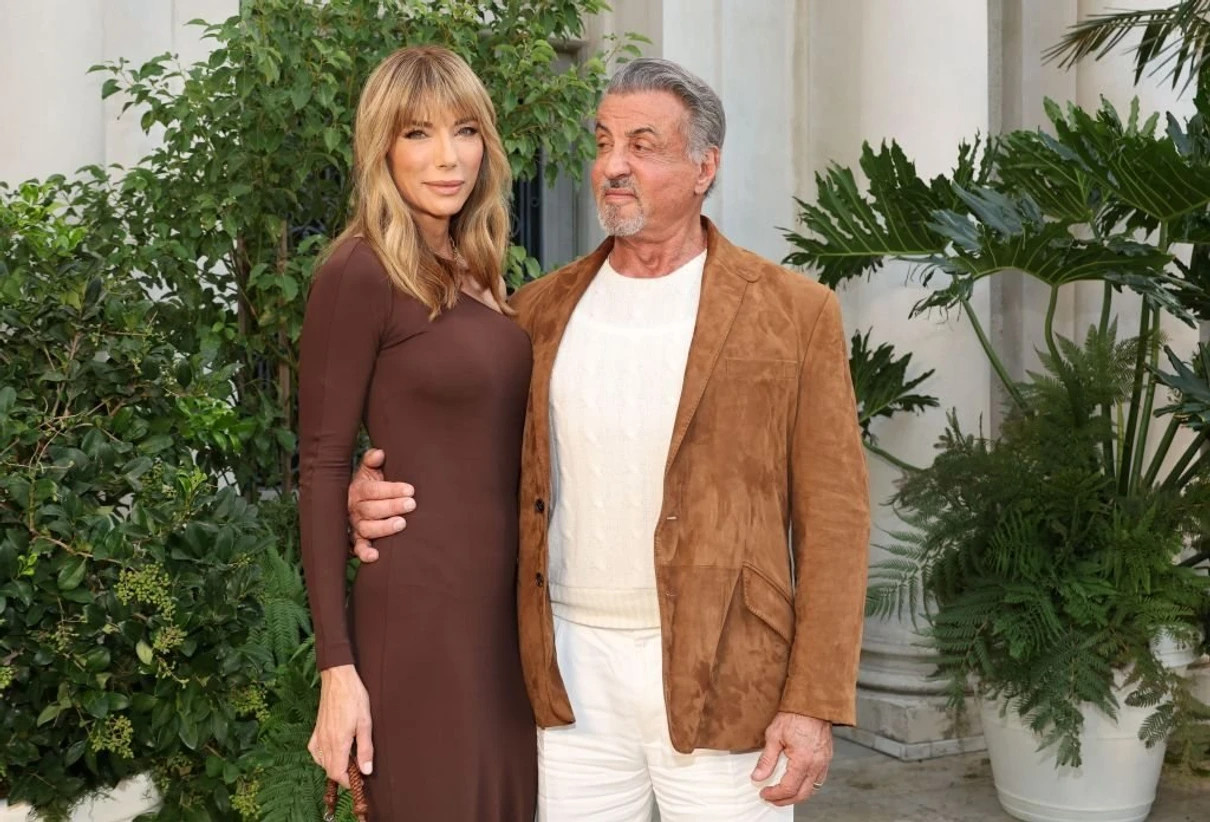 Сильвестр Сталлоне і його дружина разом на хіднику