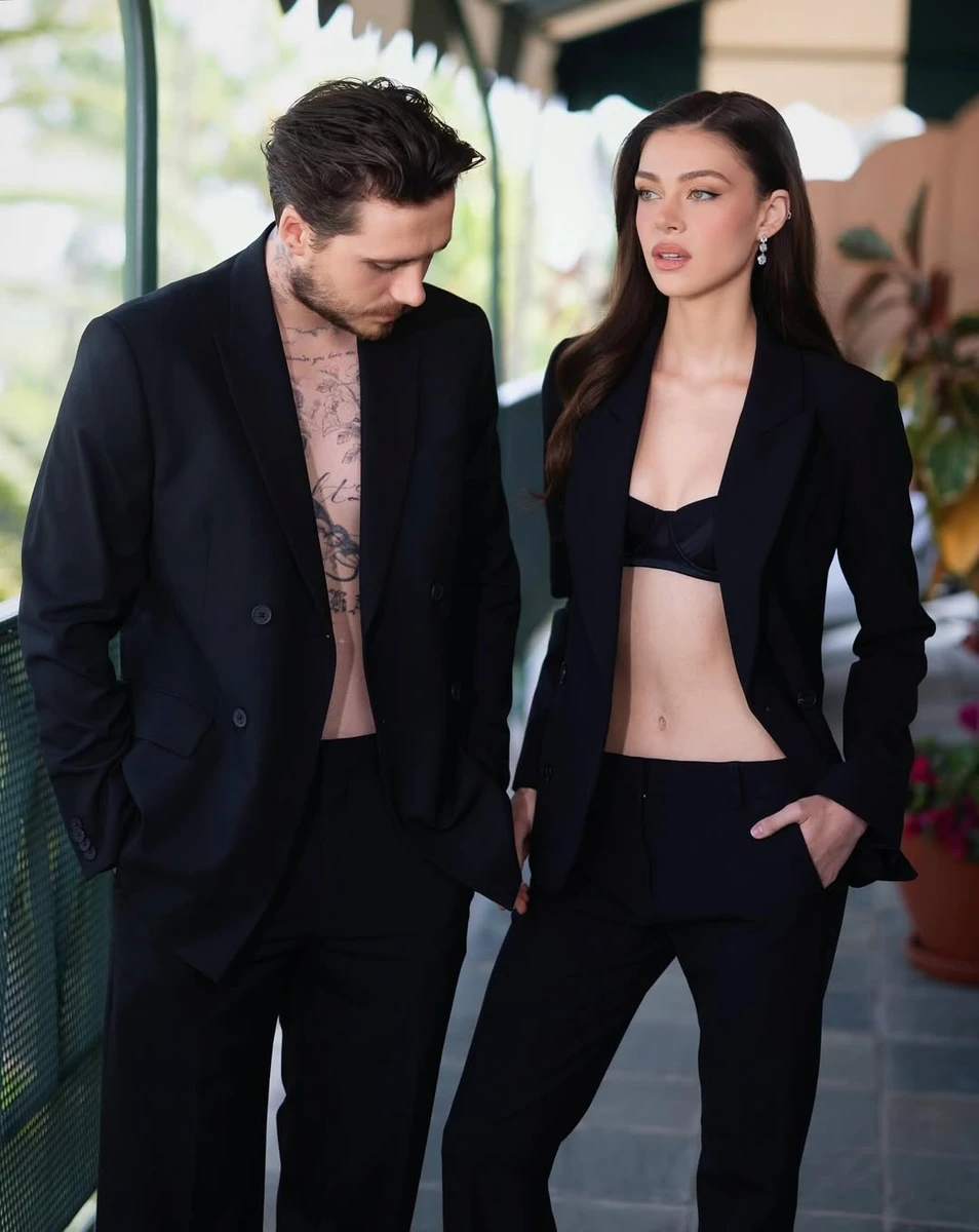 Син Бекхема з дружиною