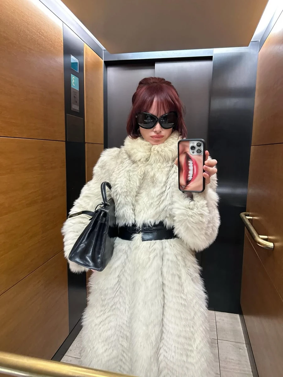 Образ із шубою та ременем