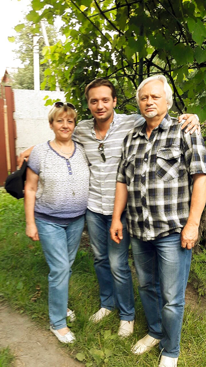 Марк Дробот з батьками