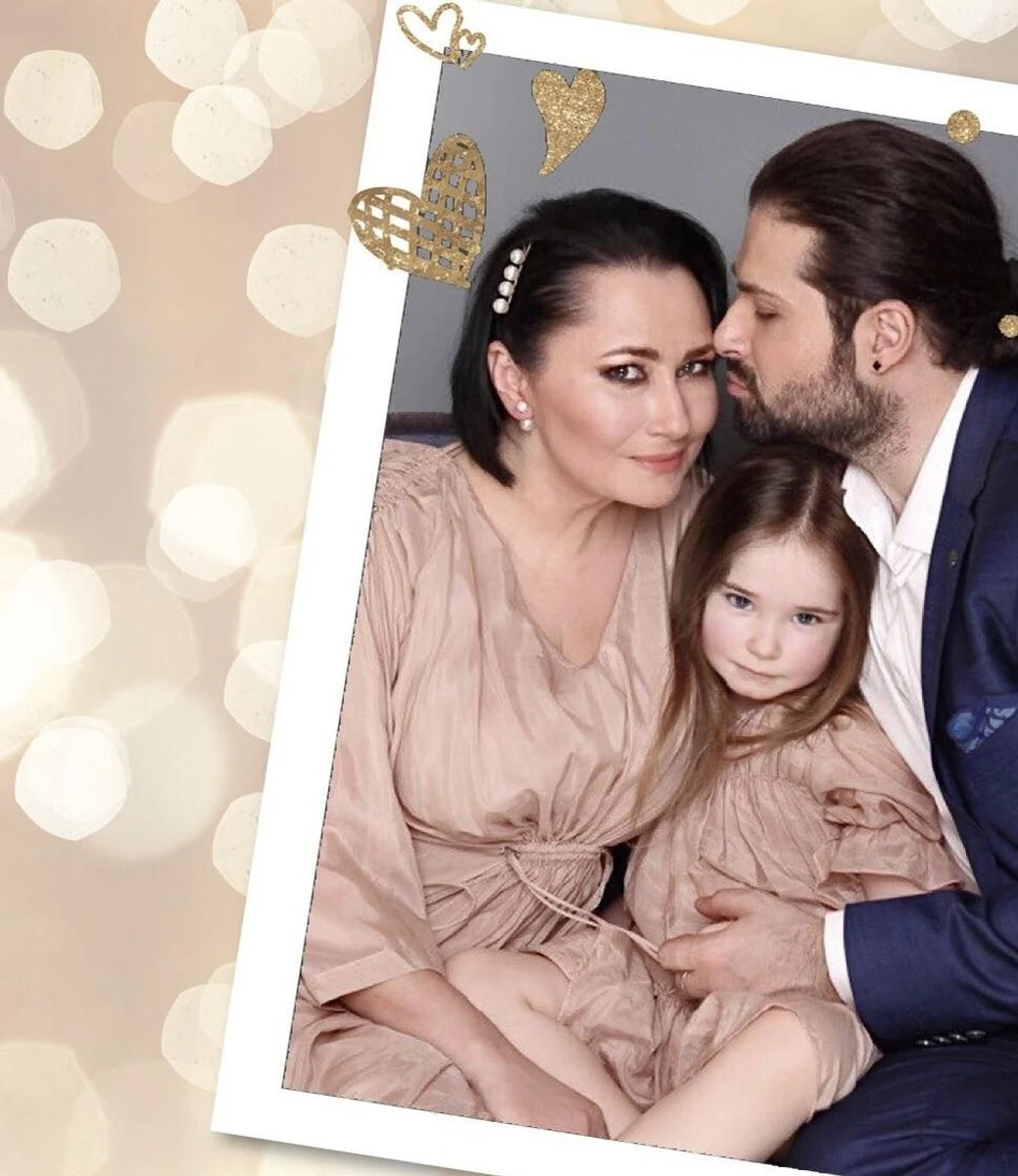 Мозгова з дочкою та чоловіком