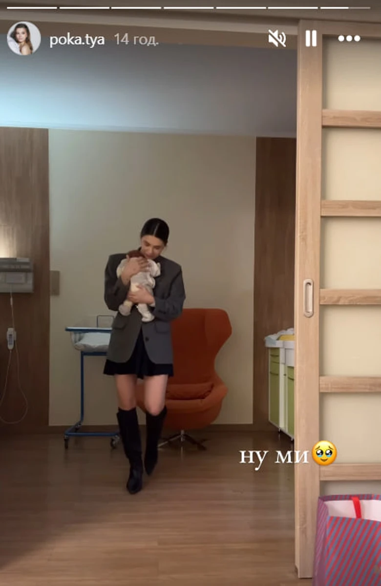 Катерина Остапчук тримає сина на руках