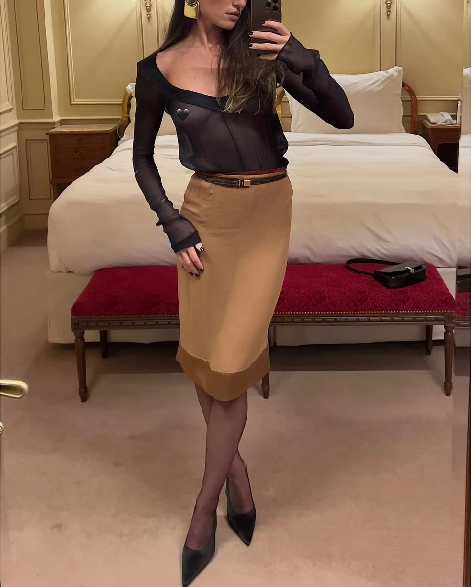 Прозора блузка