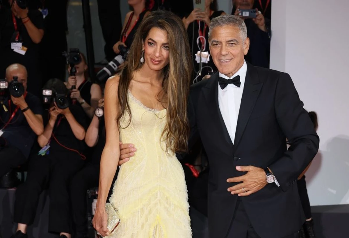 Клуні з дружиною