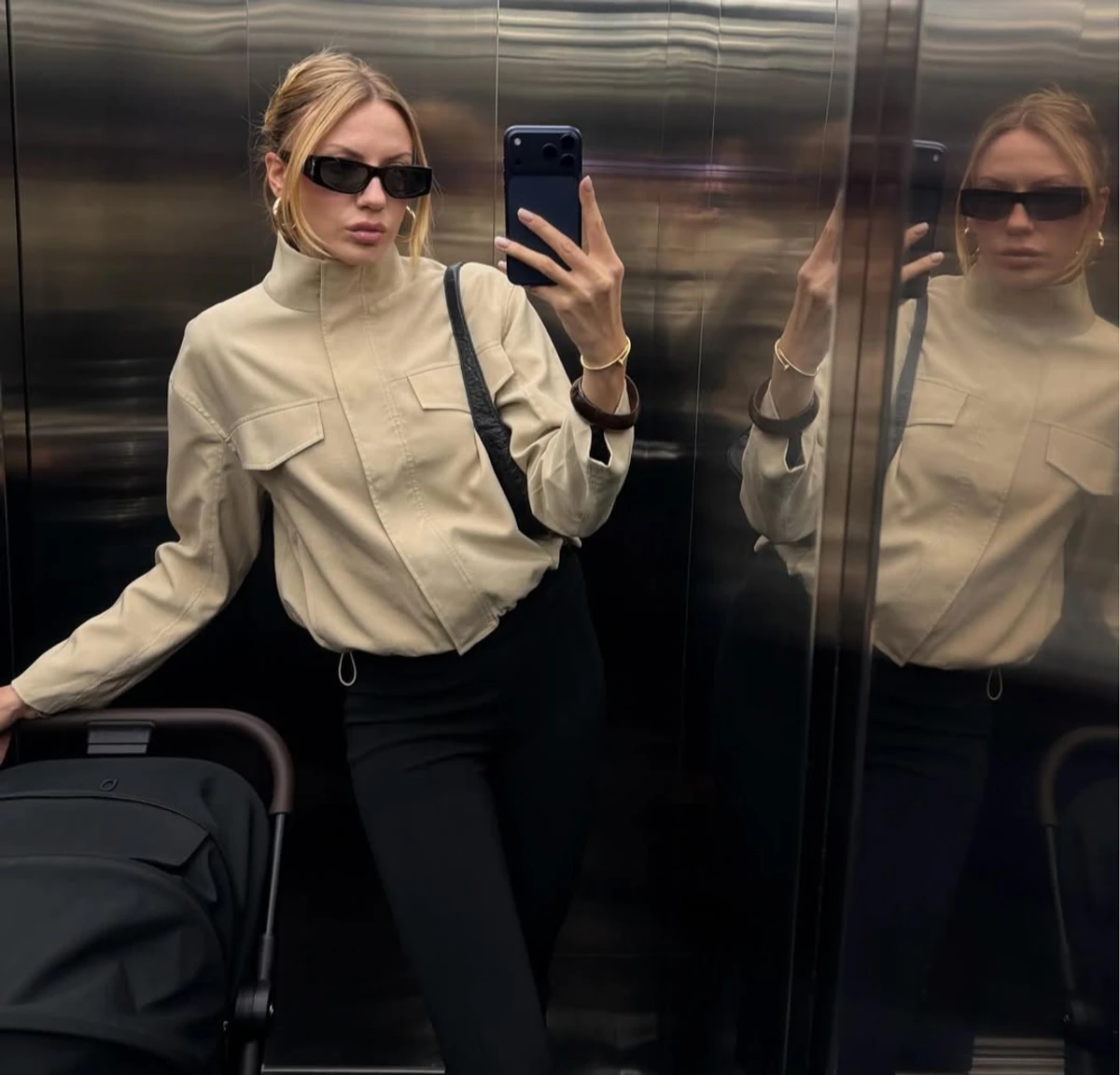 Леся Нікітюк у стильному луці попозувала з візочком у ліфті