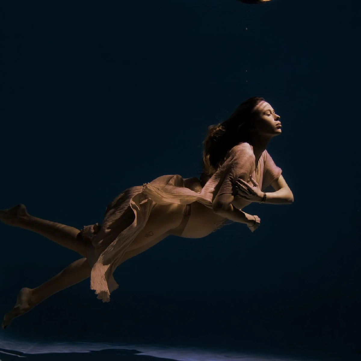 До речі, фотосет у воді (з майбутньою дитиною) робила і блогерка Таня Парфільєва