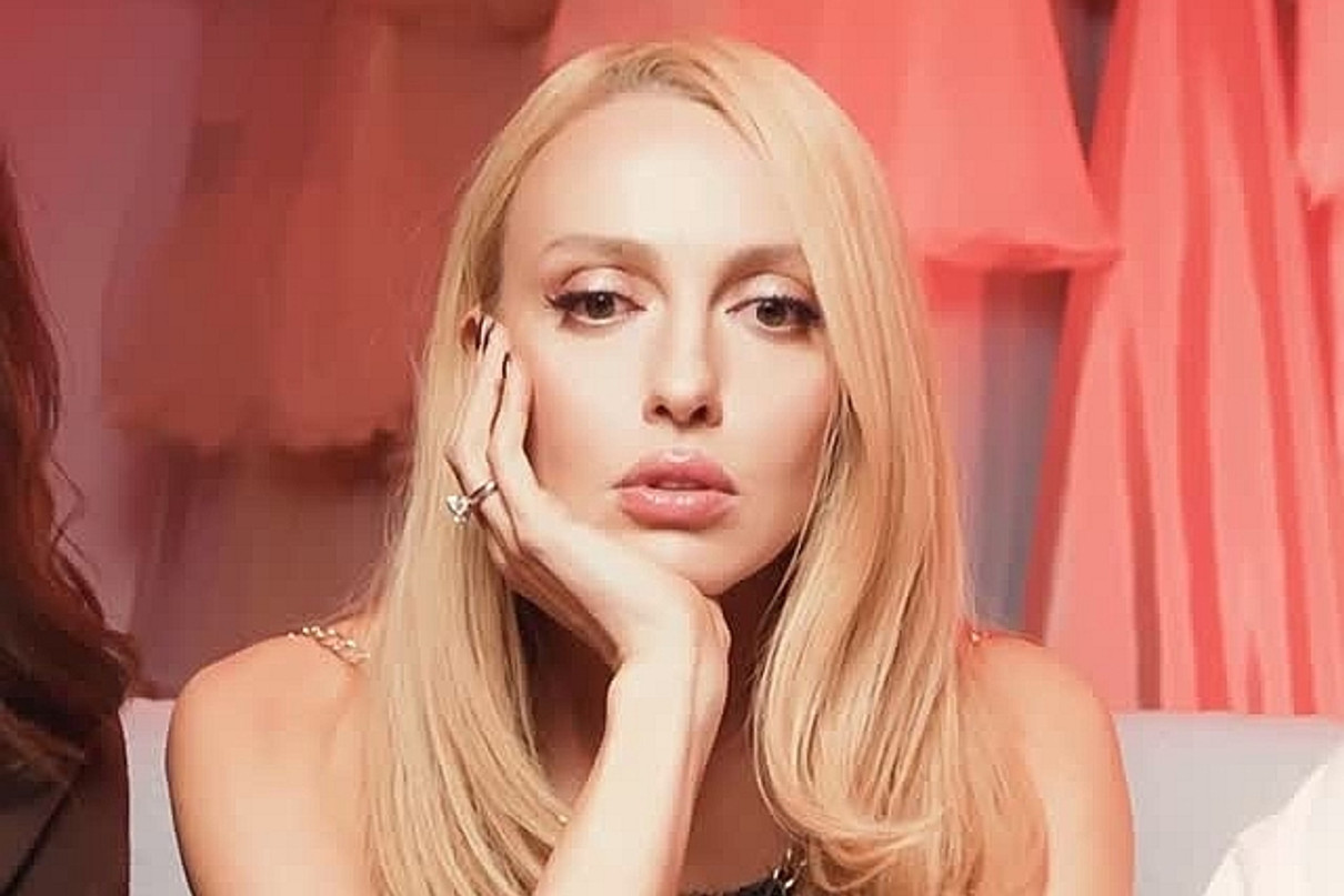 Оля Полякова